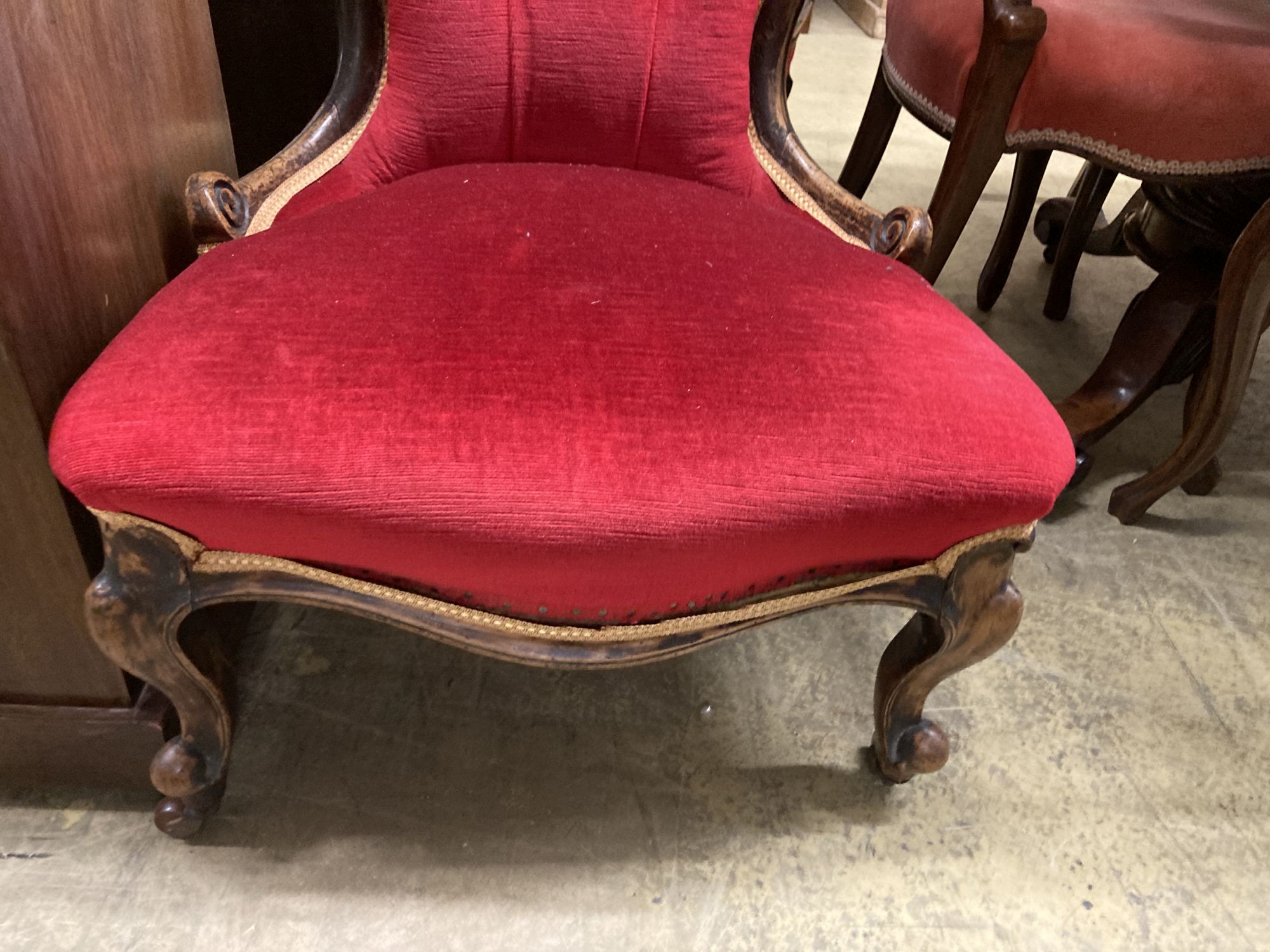 Two Victorian mahogany spoon back nursing chairs